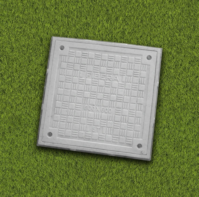 Square FRP composite tank cover installed in garden lawn turf