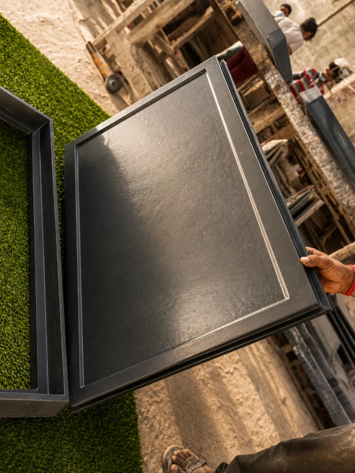 Large black rectangular FRP heavy-duty recessed cover.
